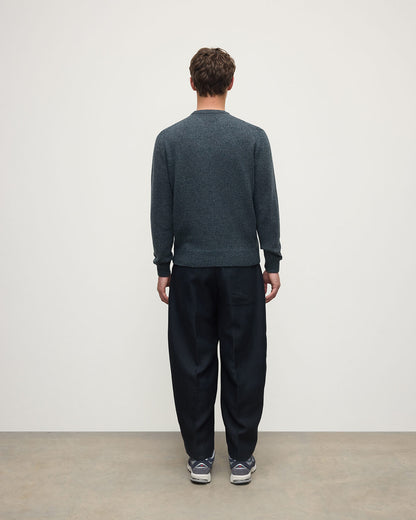 Back view of a model wearing Johnstons of Elgin AW25 Men's Knitwear Storm Donegal Donegal Cashmere Marl Jumper KAC05287006336