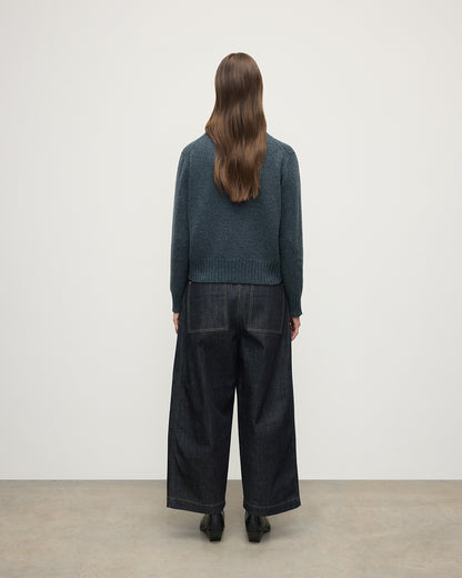 Model wearing Johnstons of Elgin AW25 Women's Knitwear Storm Donegal Donegal Blue Cashmere Jumper back View KAC05289006336