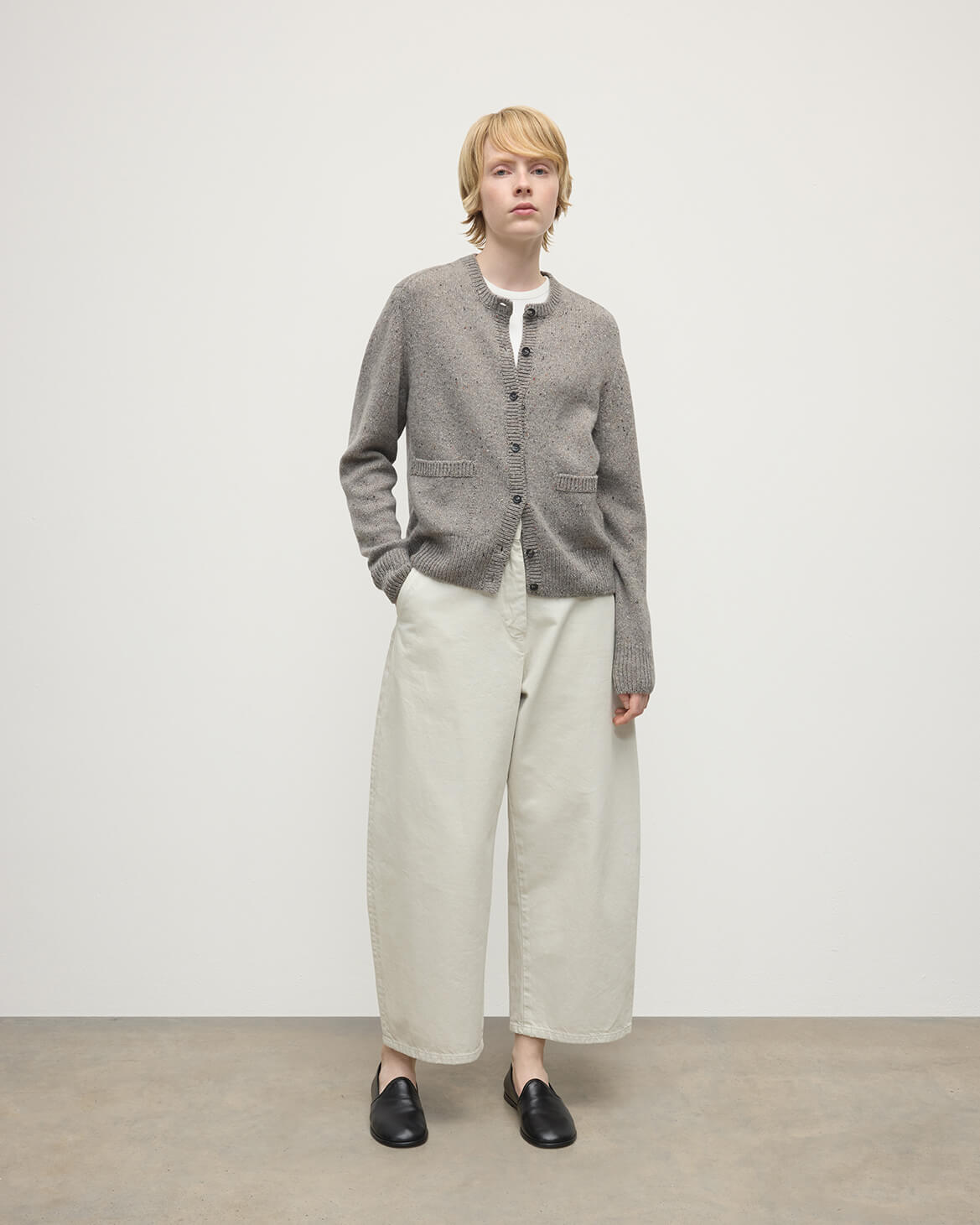 Model wears Johnstons of Elgin AW25 Women's Knitwear Peregrine Donegal Donegal Cashmere Grey Cardigan Front View KAC05494006335