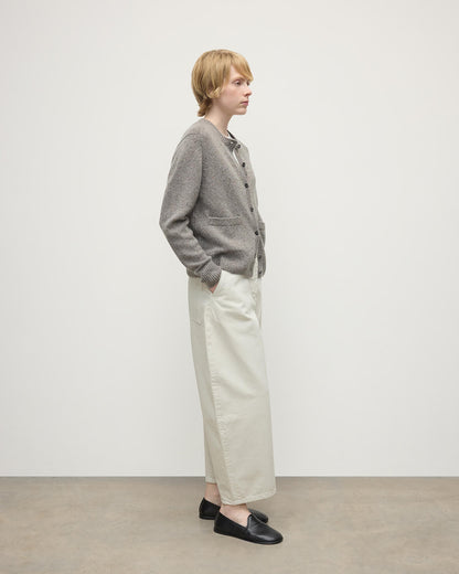 Model wears Johnstons of Elgin AW25 Women's Knitwear Peregrine Donegal Donegal Cashmere Grey Cardigan Side View KAC05494006335