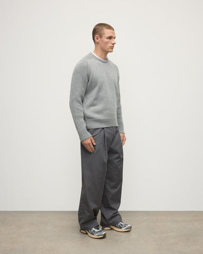 Side view of model wearing Johnstons of Elgin AW25 Men's Knitwear Light Grey Ribbed Grey Cashmere Jumper KAC05540HA0308