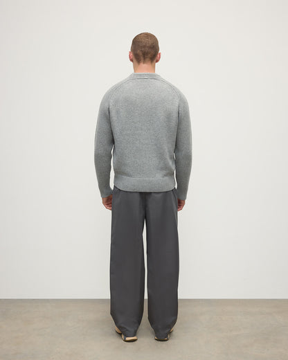 Back view of model wearing Johnstons of Elgin AW25 Men's Knitwear Light Grey Ribbed Grey Cashmere Jumper KAC05540HA0308