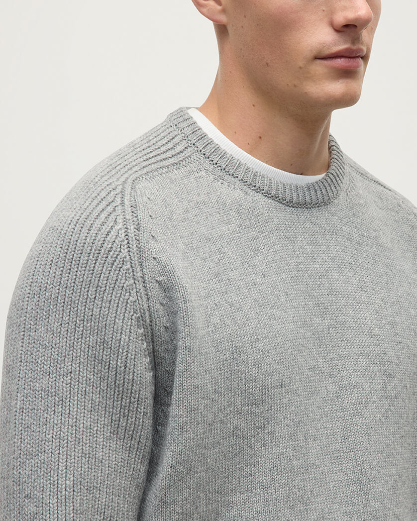 Close Up of model wearing Johnstons of Elgin AW25 Men's Knitwear Light Grey Ribbed Grey Cashmere Jumper KAC05540HA0308