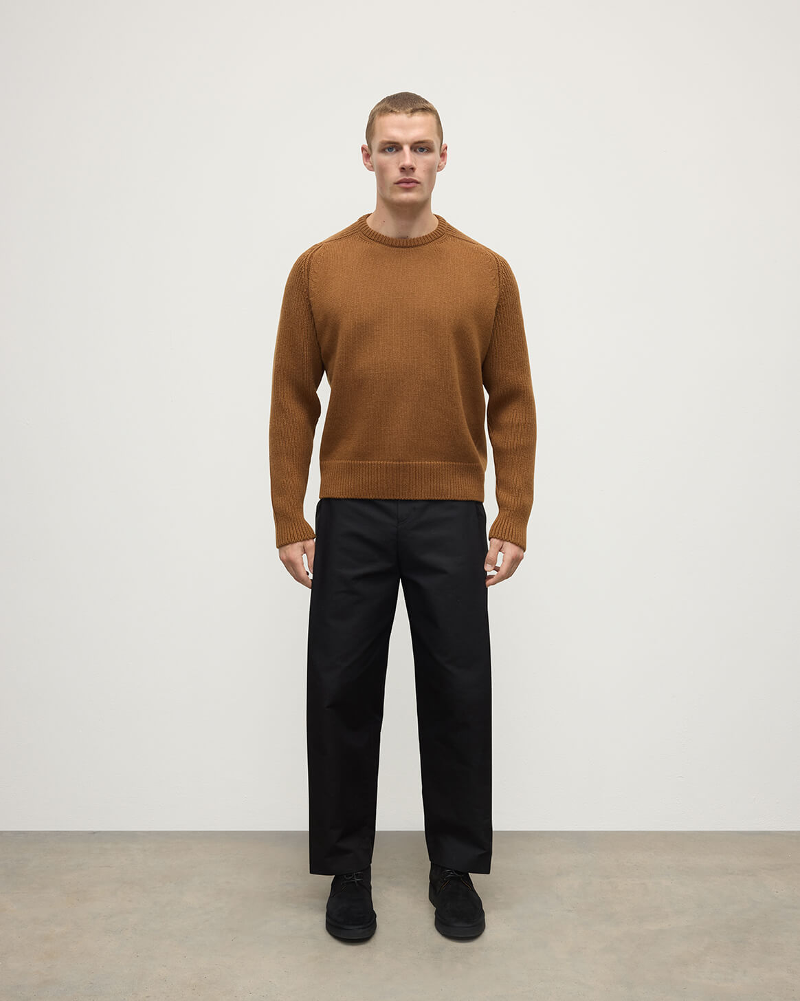Front view of model wearing Johnstons of Elgin AW25 Men's Knitwear Dark Camel Ribbed Camel Cashmere Jumper KAC05540SB4620