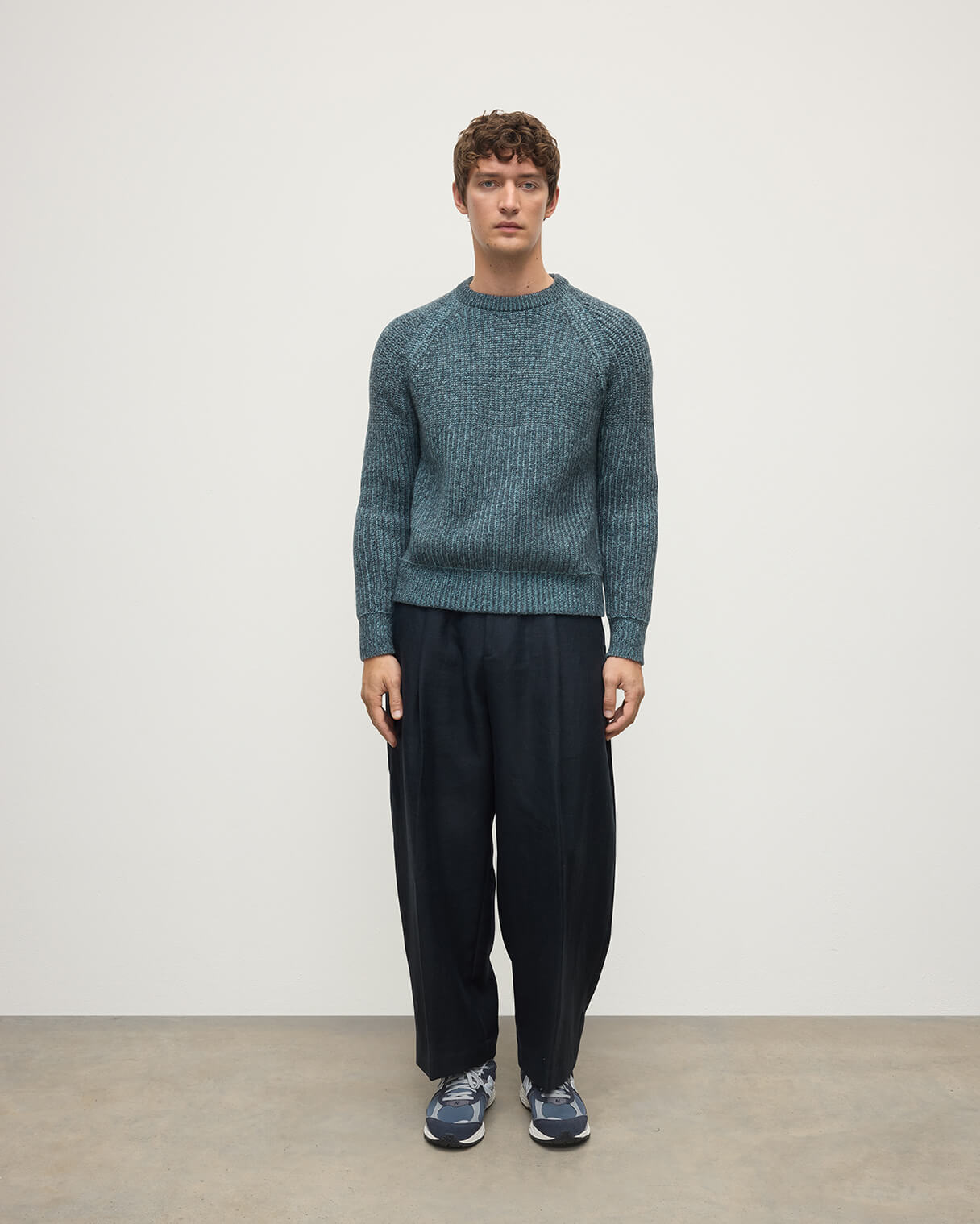 Model wears Johnstons of Elgin AW25 Men's Knitwear Storm Donegal & Seascape Ribbed Donegal Cashmere Blue Jumper Front KAC05581Q25392