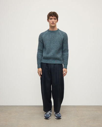 Model wears Johnstons of Elgin AW25 Men's Knitwear Storm Donegal & Seascape Ribbed Donegal Cashmere Blue Jumper Front KAC05581Q25392