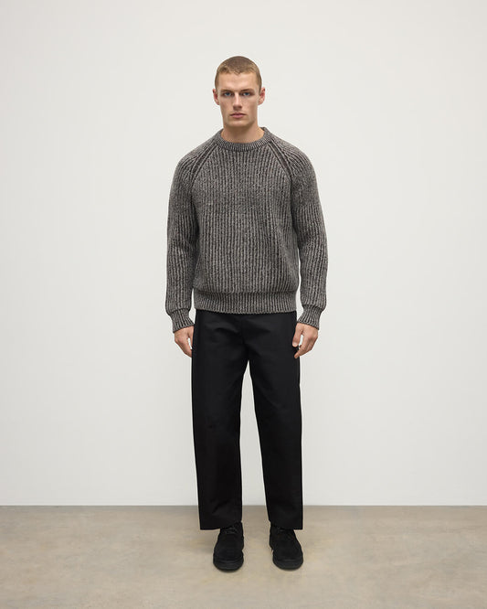 Model wearing Johnstons of Elgin AW25 Men's Knitwear Peregrine Donegal & Molasses Ribbed Donegal Cashmere Grey Jumper Front KAC05581Q25393
