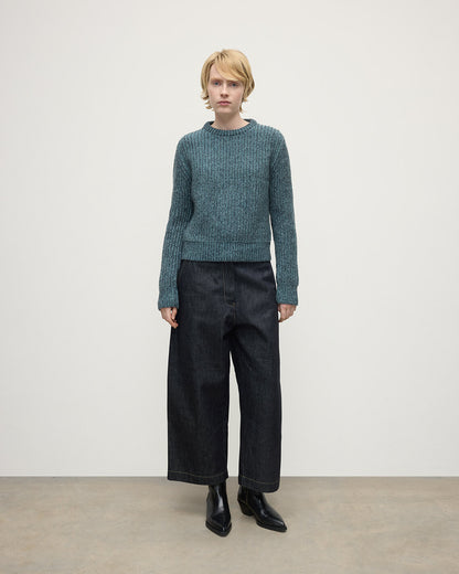 Model wearing Johnstons of Elgin AW25 Women's Knitwear Storm Donegal & Seascape High Neck Donegal Cashmere Blue Jumper Front View KAC05590Q25392