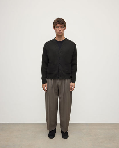 Model wears Johnstons of Elgin AW25 Men's Knitwear Iron Ribbed Cashmere Grey Cardigan Front KAC05601SC7330