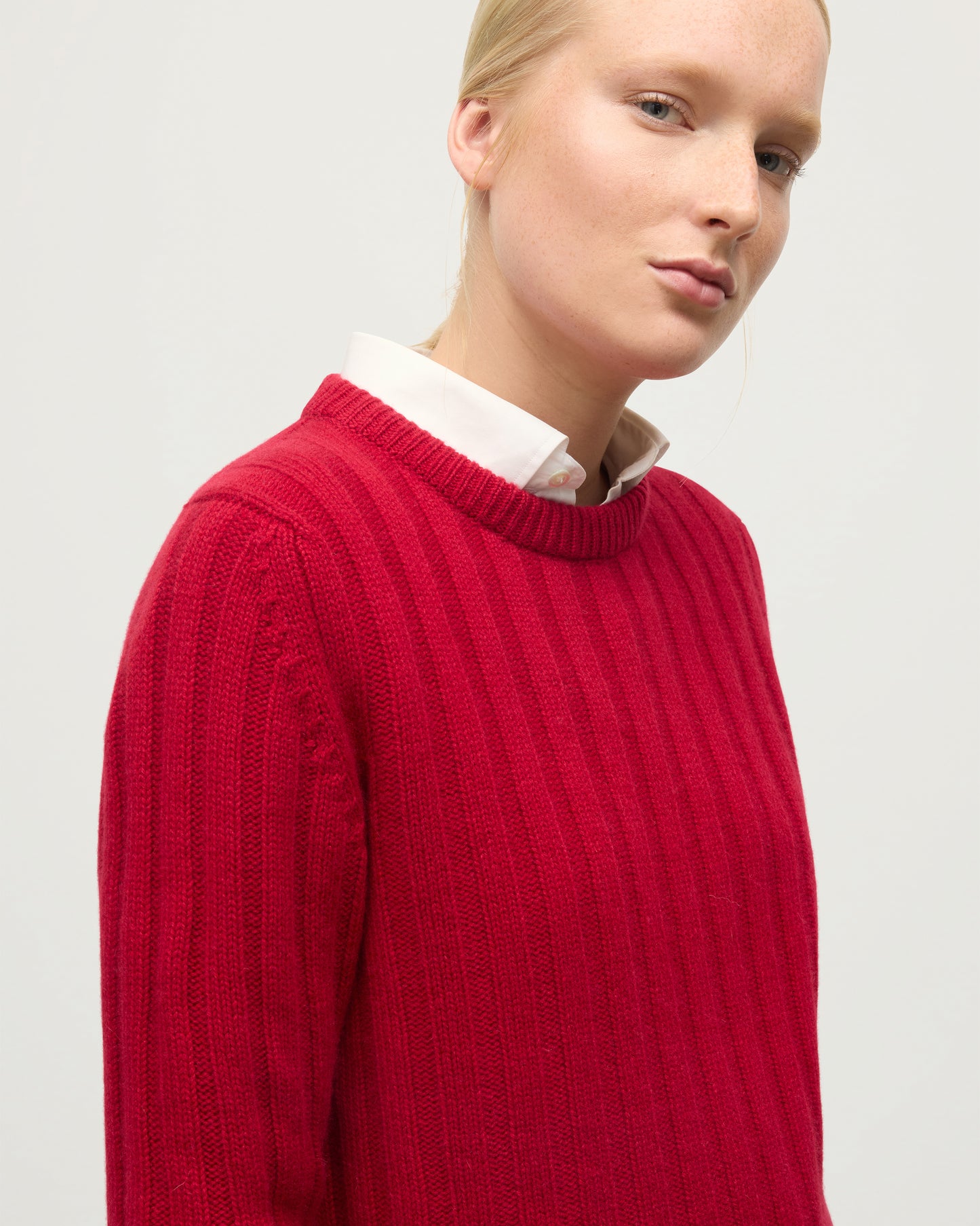 MODEL WEARING JOHNSTONS OF ELGIN WOMENS LECHT CREW SWEATER RED OVER WHITE SHIRT   KAC05706SE5325