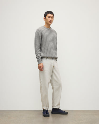 JOHNSTONS OF ELGIN MENS PEEL CREW SWEATER GREY 100% CASHMERE OVER A WHITE T-SHIRT WITH WHITE JEANS AND BLACK LOAFERS KAC05751HA0400