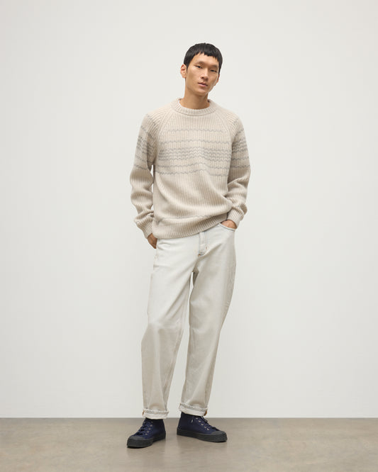 MODEL WEARING JOHNSTONS OF ELGIN MENS SUMMIT CREW SWEATER NATURAL & GREY 100% CASHMERE WITH CREAM JEANS KAC05752Q25975