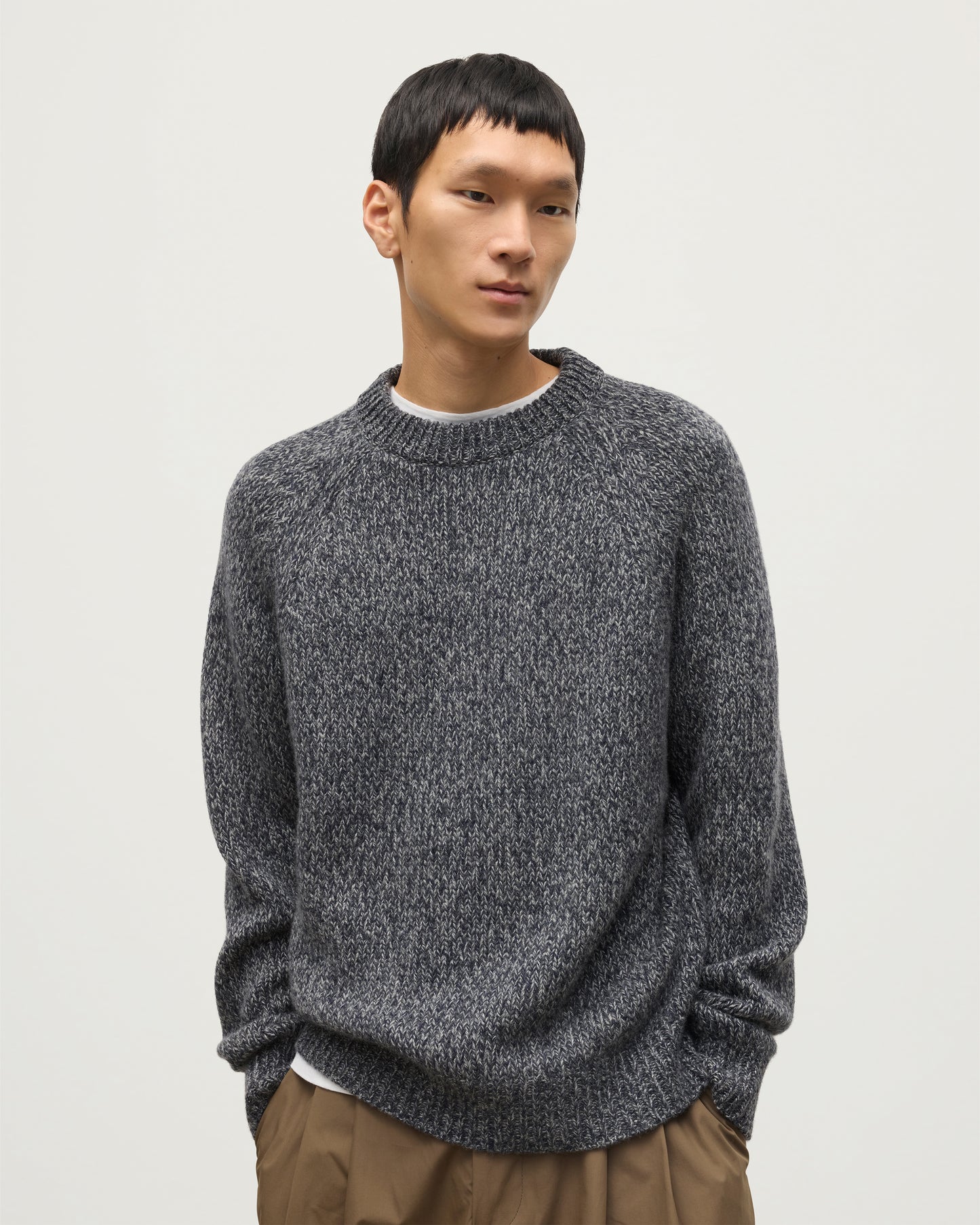 MALE MODEL WEARS JOHNSTONS OF ELGIN FYFE CREW SWEATER NAVY 100% CASHMERE KAC05753006876