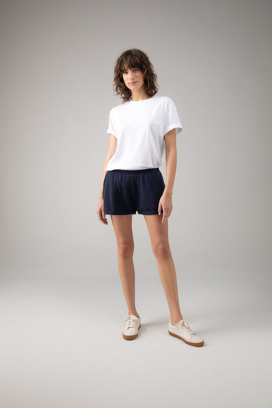 Johnstons of Elgin Women’s Cashmere Camisole Shorts in Navy on grey background KAI05078SD0707