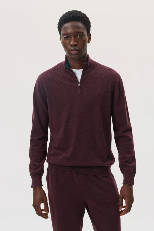 Model wearing Johnstons of Elgin SS25 Men's Knitwear Rosewood & Emerald Contrast Trim Cashmere Zip Neck Jumper  KAI05233Q25116