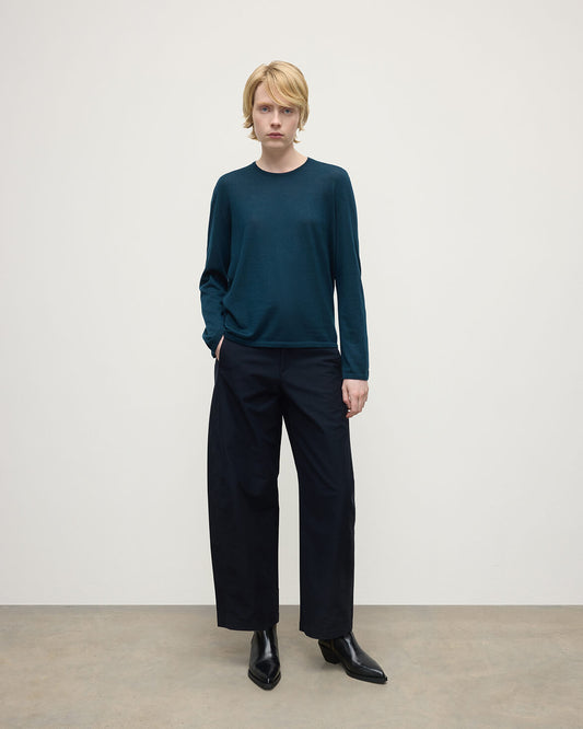 Model wearing Johnstons of Elgin AW25 Women's Knitwear Bottle Green Superfine Cashmere Green Jumper Front View KAI05318SC7344