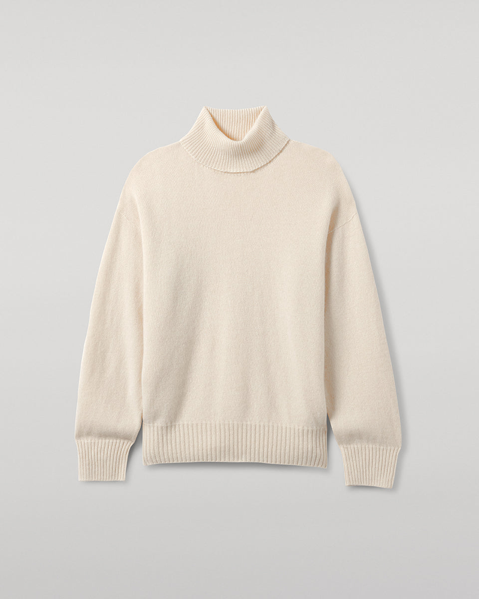 Johnstons of Elgin AW25 Women's Knitwear Champagne Gauzy Cashmere Cream Roll Neck Jumper Close Up  KAI05324SA0502
