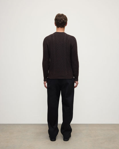 Model wearing Johnstons of Elgin AW25 Men's Knitwear Molasses Aran Cable Brown Cashmere Jumper Back KAI05336SB7290