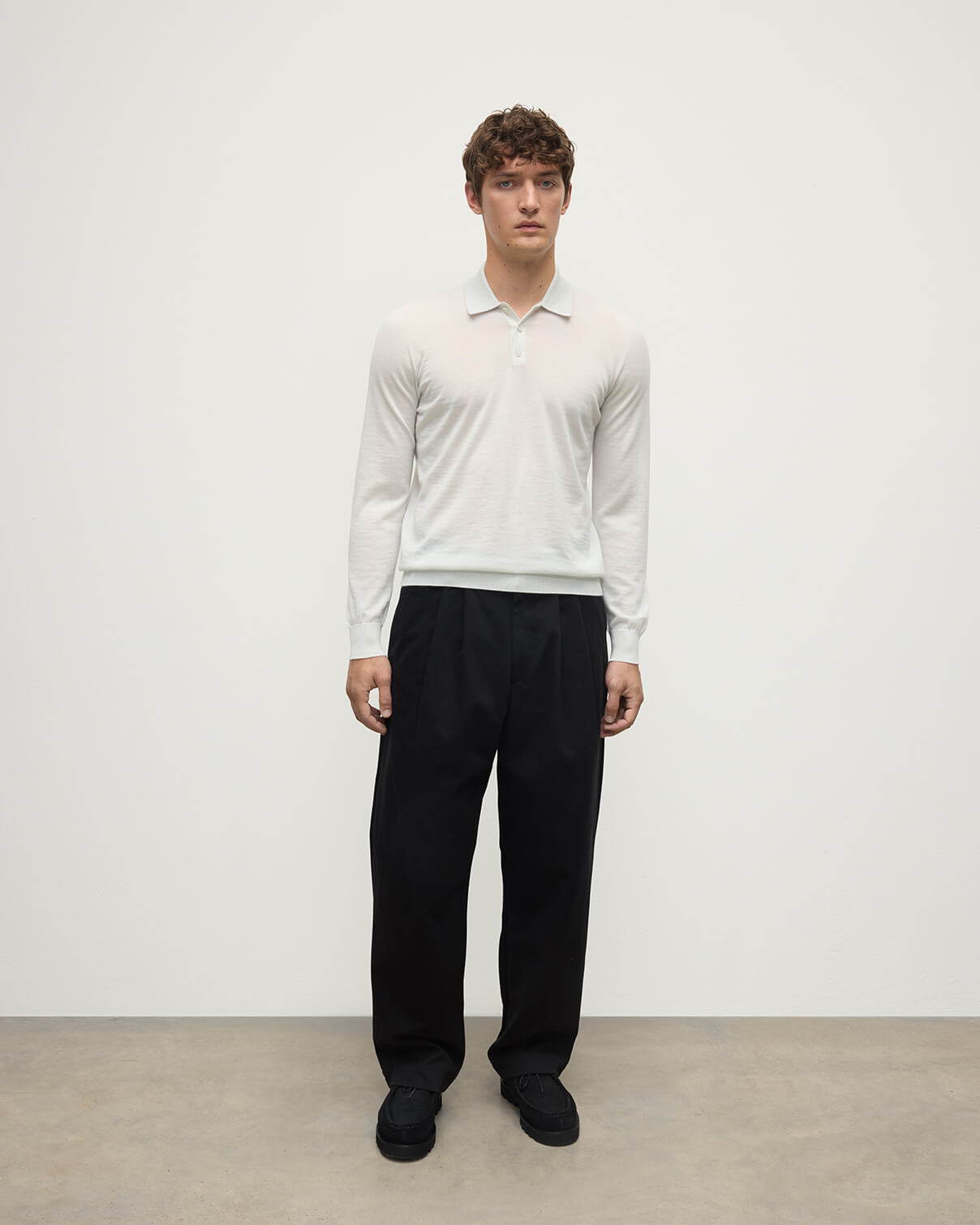 Model wearing Johnstons of Elgin AW25 Men's Knitwear Zinc White White Cashmere Polo Shirt KAI05481HA0327