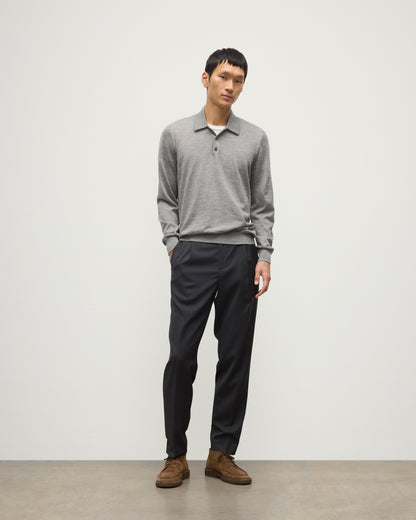 MODEL WEARING JOHNSTONS OF ELGIN MENS FIN SUPERFINE LONG SLEEVE POLOSHIRT GREY 100% SUPERFINE CASHMERE WITH BLACK TROUSERS KAI05481HA4253