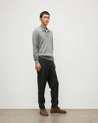 MODEL WEARING JOHNSTONS OF ELGIN MENS FIN SUPERFINE LONG SLEEVE POLOSHIRT GREY 100% SUPERFINE CASHMERE WITH BLACK TROUSERS KAI05481HA4253