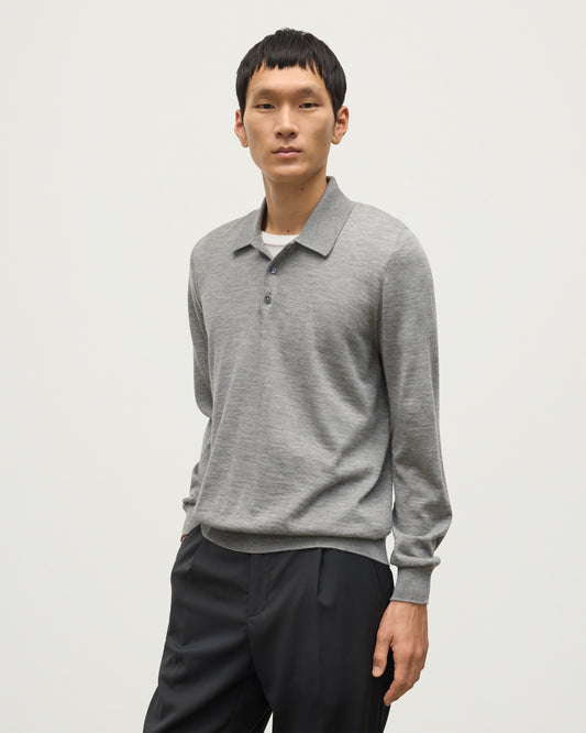 MODEL WEARING JOHNSTONS OF ELGIN MENS FIN SUPERFINE LONG SLEEVE POLOSHIRT GREY 100% SUPERFINE CASHMERE WITH BLACK TROUSERS KAI05481HA4253