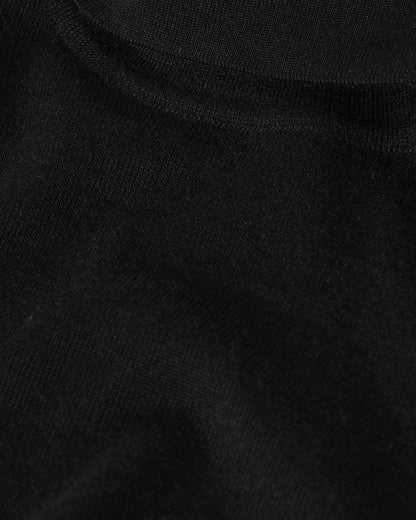 Johnstons of Elgin AW25 Women's Knitwear Black Superfine Cashmere Black Roll Neck Jumper close up KAI05607SA7146