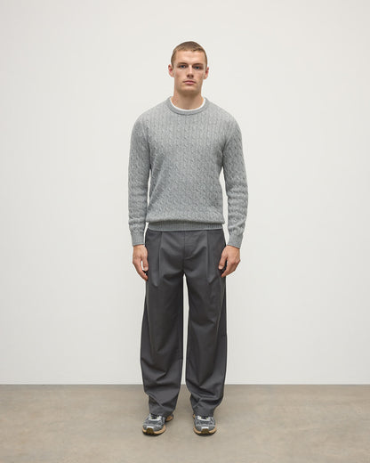 Model wears Johnstons of Elgin AW25 Men's Knitwear Light Grey Cable Knit Grey Cashmere Jumper Front KAI05693HA0308
