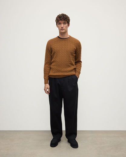 Model wearing Johnstons of Elgin AW25 Men's Knitwear Dark Camel Cable Knit Camel Cashmere Jumper Front KAI05693SB4620