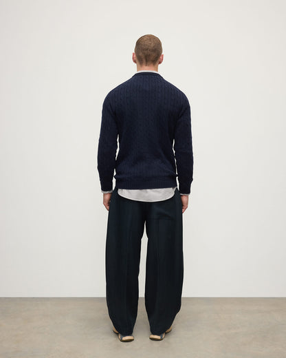 Model is wearing Johnstons of Elgin AW25 Men's Knitwear Dark Navy Cable Knit Navy Cashmere Jumper Back  KAI05693SD7666