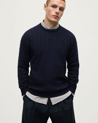 Model is wearing Johnstons of Elgin AW25 Men's Knitwear Dark Navy Cable Knit Navy Cashmere Jumper Close Up KAI05693SD7666
