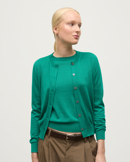 MODEL WEARING JOHNSTONS OF ELGIN WOMENS HONOR CREW CARDIGAN GREEN 100% SUPERFINE CASHMERE KAI05708SC4714