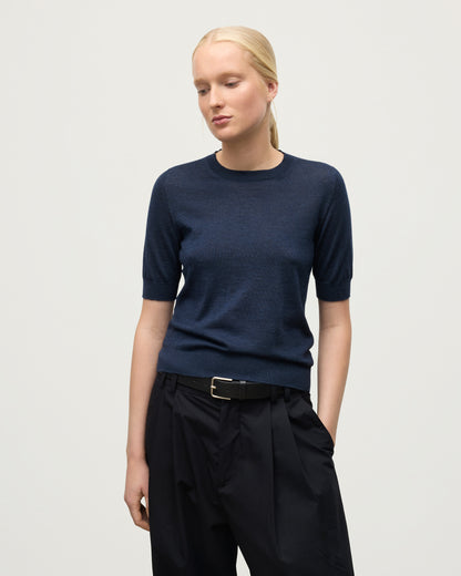 MODEL WEARS JOHNSTONS OF ELGIN WOMENS HONOR SHORT SLEEVE CREW NAVY 100% SUPERFINE CASHMERE KAI05712HD7350