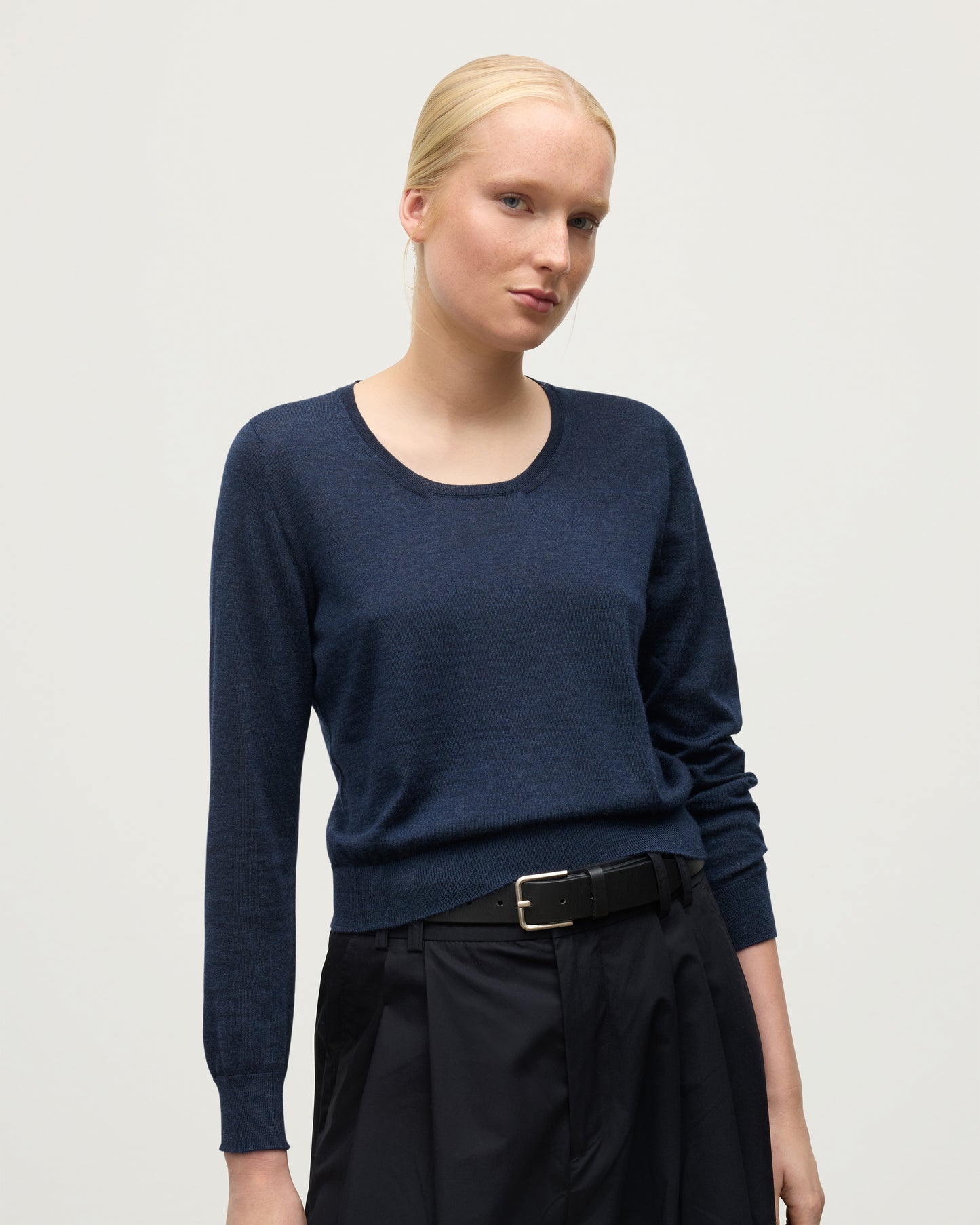 MODEL WEARING JOHNSTONS OF ELGIN WOMENS ELLA SCOOP SWEATER NAVY KAI05723HD7350