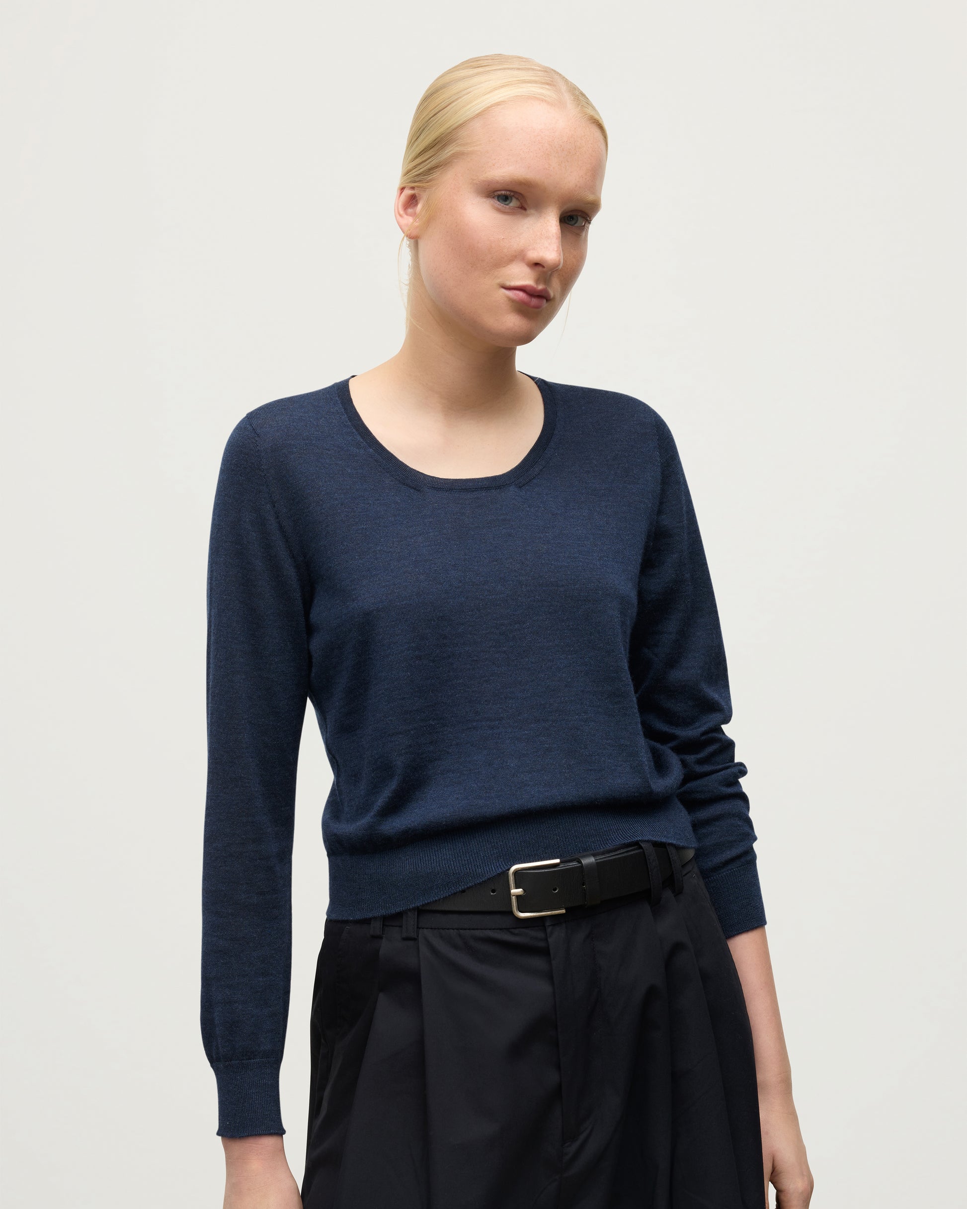 MODEL WEARING JOHNSTONS OF ELGIN WOMENS ELLA SCOOP SWEATER NAVY KAI05723HD7350