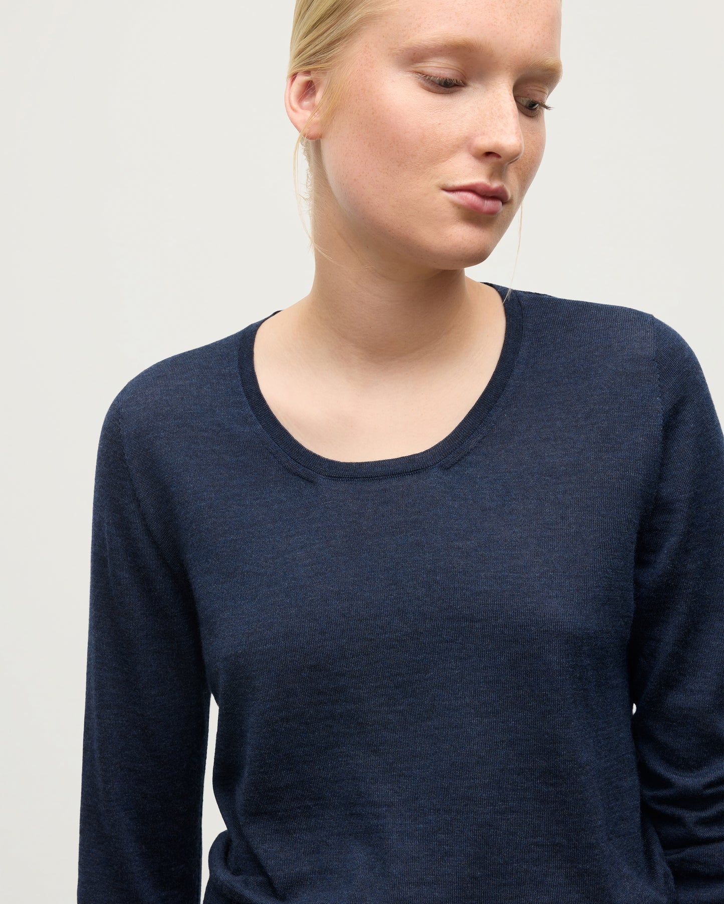 MODEL WEARING JOHNSTONS OF ELGIN WOMENS ELLA SCOOP SWEATER NAVY KAI05723HD7350
