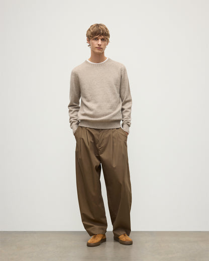 MENS TIREE CREW SWEATER NATURAL 100% DONEGAL CASHMERE BY JOHNSTONS OF ELGIN, OVER A WHITE TEE WITH GREEN TROUSERS KAI05755HA0397