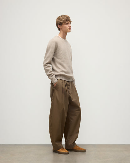 MENS TIREE CREW SWEATER NATURAL 100% DONEGAL CASHMERE BY JOHNSTONS OF ELGIN, OVER A WHITE TEE WITH GREEN TROUSERS KAI05755HA0397