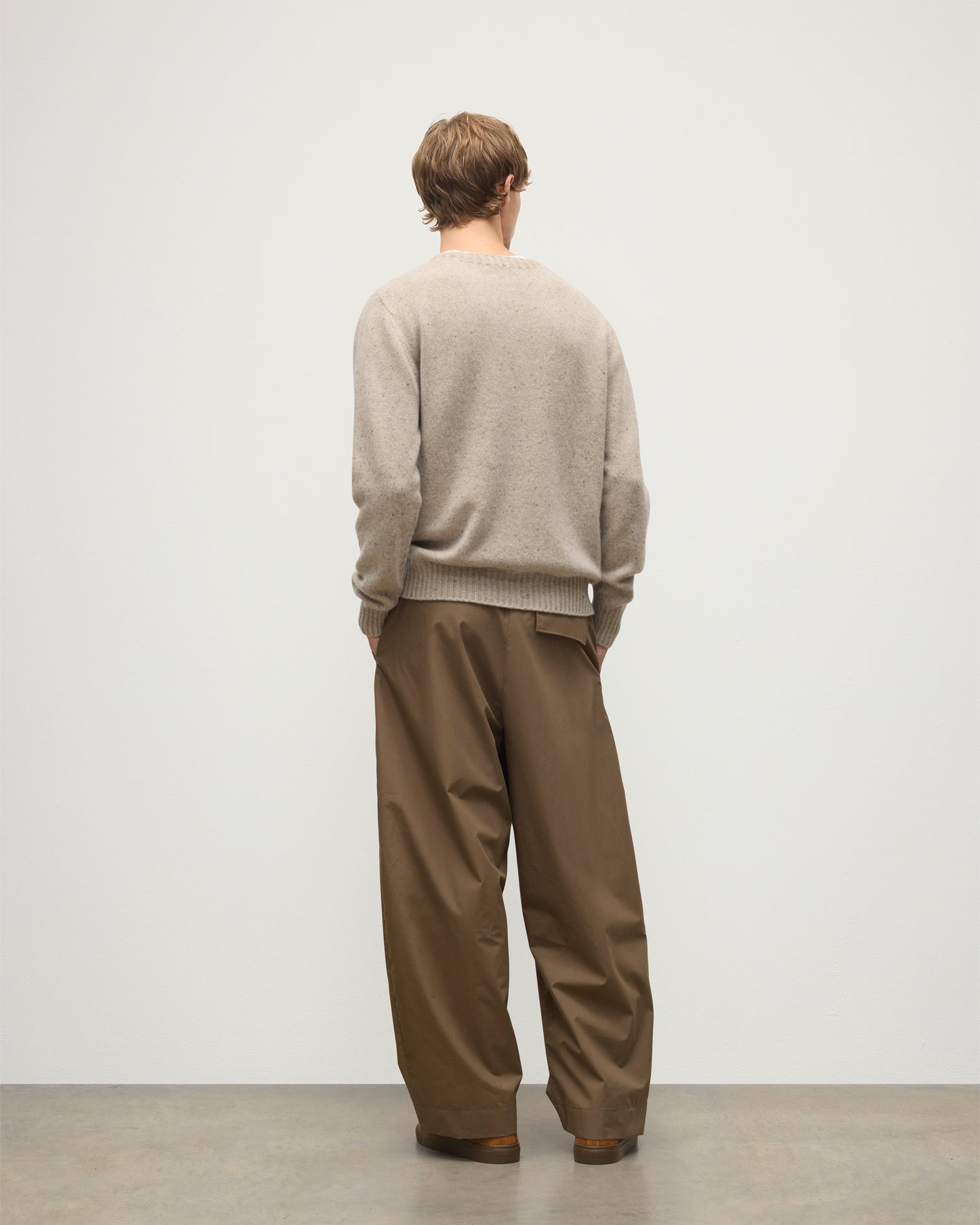 MENS TIREE CREW SWEATER NATURAL 100% DONEGAL CASHMERE BY JOHNSTONS OF ELGIN, OVER A WHITE TEE WITH GREEN TROUSERS KAI05755HA0397