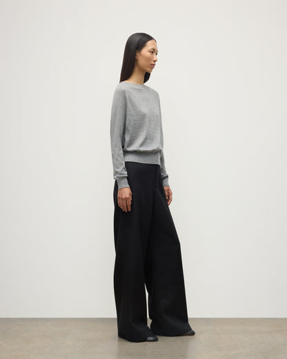 MODEL WEARS JOHNSTONS OF ELGIN WOMENS FINOLA SWEATER GREY WITH BLACK TROUSERS KAI05789HA4253