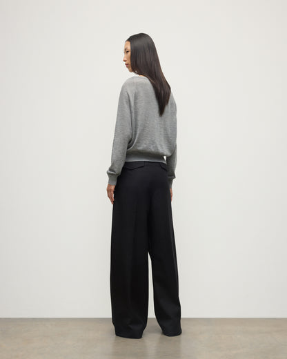 MODEL WEARS JOHNSTONS OF ELGIN WOMENS FINOLA SWEATER GREY WITH BLACK TROUSERS KAI05789HA4253