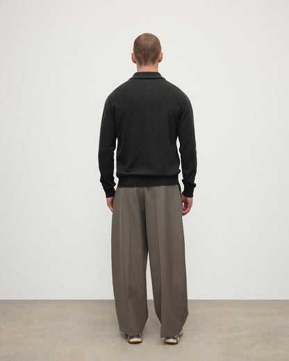 Johnstons of Elgin AW25 Men's Knitwear Iron Cashmere Long Sleeve Grey Poloshirt worn by model back view KAP05268Q25357