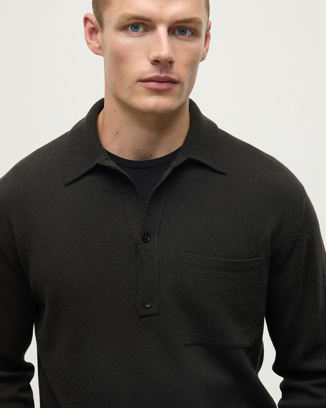 Johnstons of Elgin AW25 Men's Knitwear Iron Cashmere Long Sleeve Grey Poloshirt worn by model details view KAP05268Q25357
