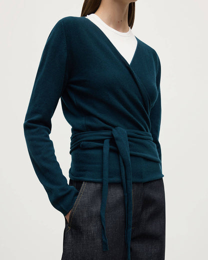 Model wearing Johnstons of Elgin AW25 Women's Knitwear Bottle Green Ballet Wrap Green Cashmere Cardigan Close Up KAP05408SC7341