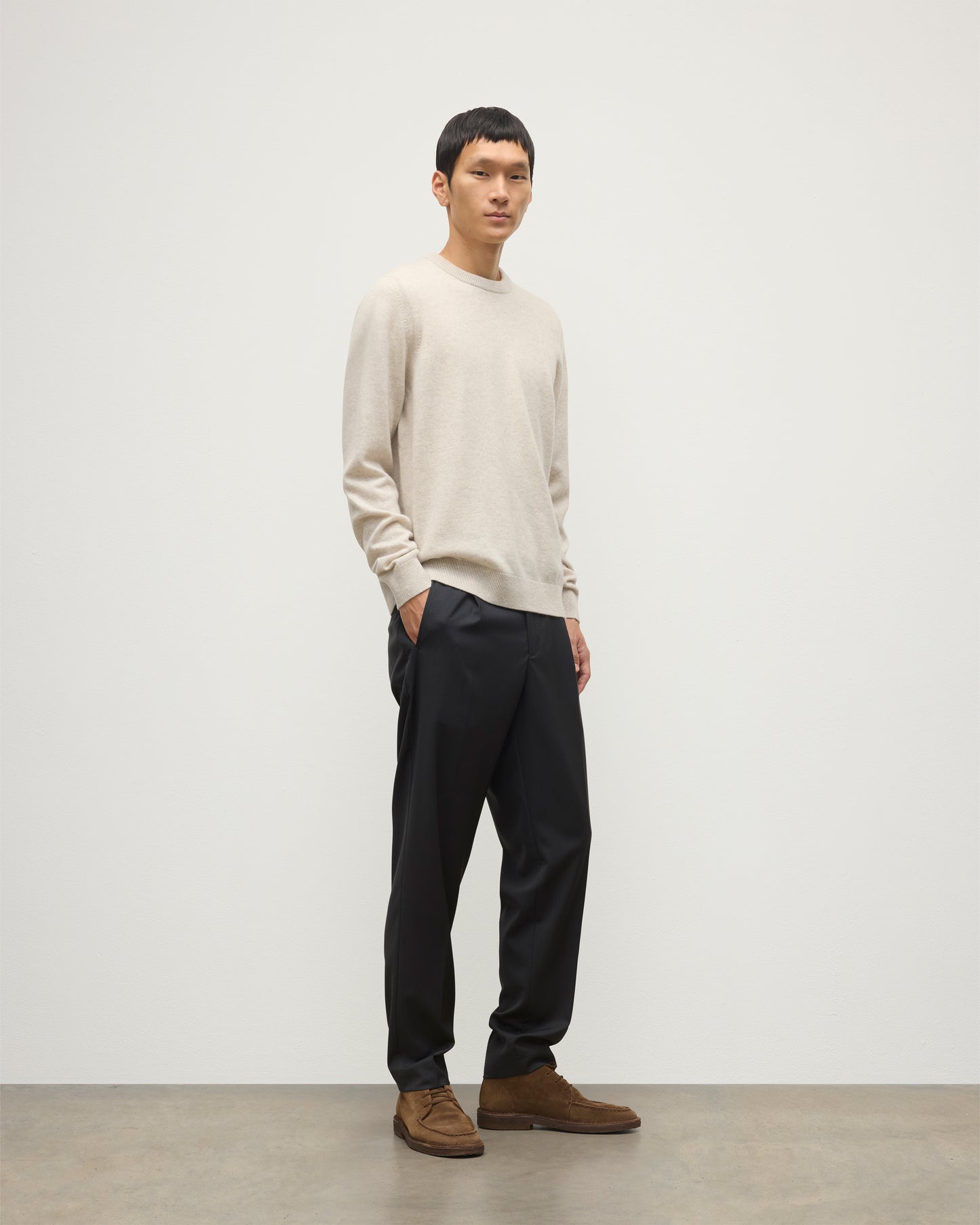 MENS RORY CREW CLASSIC JUMPER NATURAL 100% CASHMERE, BY JOHNSTONS OF ELGIN, WORN WITH GREY TROUSERS AND BROWN LAOFERS KAP05471HA0402