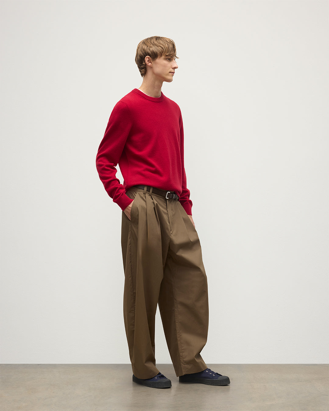 MODEL WEARS JOHNSTONS OF  ELGIN MENS RORY CREW CLASSIC JUMPER RED 100% CASHMERE WITH BROWN TROUSERS KAP05471SE5325