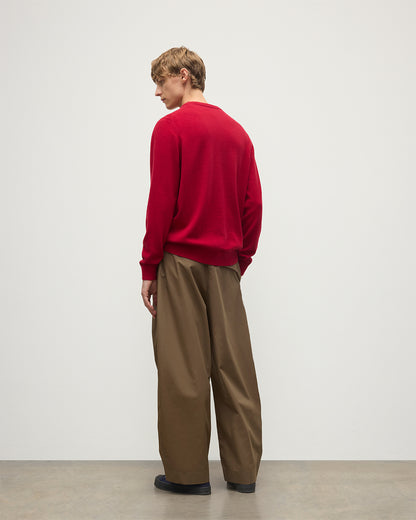 MODEL WEARS JOHNSTONS OF  ELGIN MENS RORY CREW CLASSIC JUMPER RED 100% CASHMERE WITH BROWN TROUSERS KAP05471SE5325