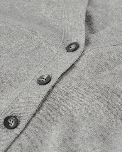 Model wears Johnstons of Elgin  Women's Knitwear Light Grey Milano Stitch Grey Cashmere Cardigan Front View KAP05489HA0308