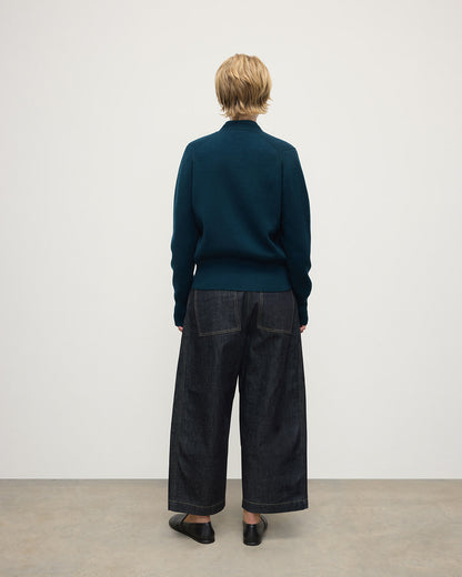 Modell wears Johnstons of Elgin Women's Knitwear Bottle Green Milano Stitch Green Cashmere Cardigan Front View KAP05489SC7341