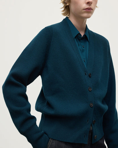 Modell wears Johnstons of Elgin Women's Knitwear Bottle Green Milano Stitch Green Cashmere Cardigan Front View KAP05489SC7341